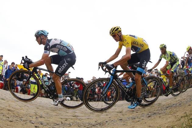 MARTIN Tony of Etixx - Quick Step and FROOME Christopher of Team Sky and CONTADOR Alberto of Tinkoff - Saxo in action on the cobblestones during the stage 4 of the 102nd edition of the Tour de France 2015 with start in Seraing and finish in Cambrai, France (223 kms) CYCLISME : Tour de France - Etape 4 - Seraing Cambrai - 07 07 2015 PhotoNews Panoramic 