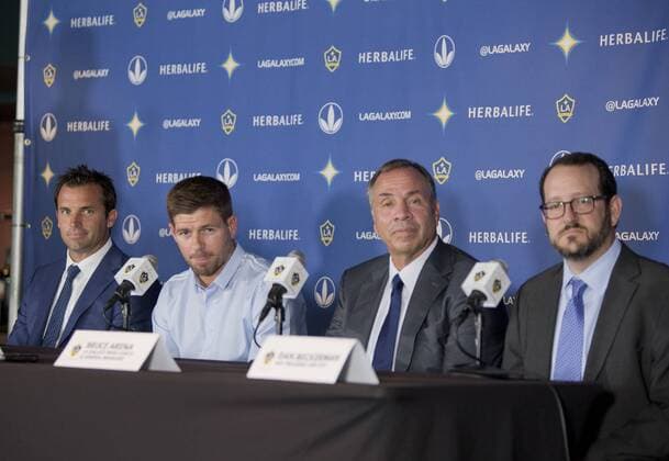 July 7, 2015 - Carson, California, U.S - New Los Angeles Galaxy midfielder Steven Gerrard 8 (2nd L) poses with Chris Klein, (L) LA Galaxy President, Bruce Arena(2nd R), LA Galaxy Head Coach and General Manager and Dan Beckerman, AEG President and CEO, after a news conference on Tuesday July 7, 2015 at StubHub Center in Carson, California. The former Liverpool captain Steven Gerrard is scheduled to play his first MLS Fussball Herren USA match on Friday, July 17 at StubHub Center against San Jose Earthquakes. Steven Gerrard is introduced to the media - ZUMAp124