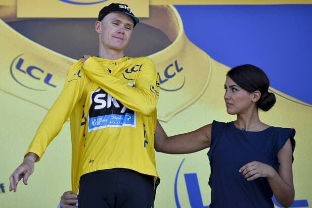 - MUR DE BRETAGNE, FRANCE: British Chris Froome of Team Sky celebrates on the podium in the yellow jersey of leader in the overall ranking after stage 8 of the 102nd edition of the Tour de France cycling race, 181,5 km from Rennes to Mur de Bretagne, France, Saturday 11 July 2015. This year s Tour de France is taking place from 4 to 26 July. DIRKxWAEM  x04662442x