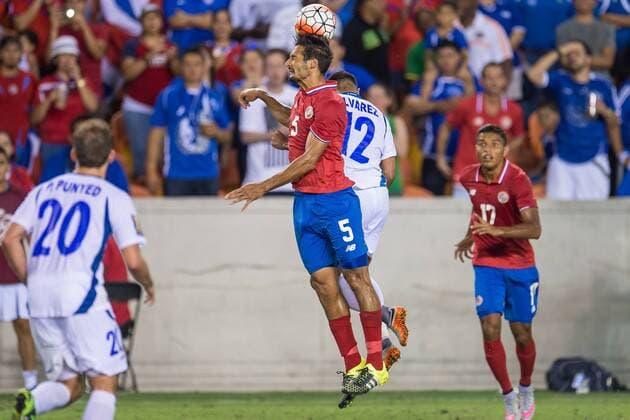July 11, 2015: Costa Rica midfielder Celso Borges (5) and El Salvador midfielder Arturo Alvarez (12) battle for a header during the 2nd half of an international CONCACAF Gold Cup soccer match between Costa Rica and El Salvador at BBVA Compass Stadium in Houston, TX. The game ended in a 1-1 draw... Soccer 2015: Costa Rica vs El Salvador JUL 11 - ZUMAc04_