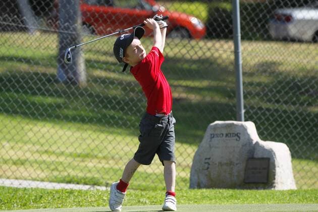July 14, 2015 - San Diego, California, United States - July 14, 2015_San Diego, CA_USA_ Louis Rickett hits during the Junior World Golf Championships 6 and under division at Colina Park Golf Course. Photo by Louis Rickett hits during the Junior World Golf Championships 6 and under division at Colina Park Golf Course. - ZUMAs44_