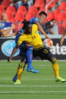 July 14, 2015: El Salvador D Alexander Mendoza (5) and Jamaica F Darren Mattocks (11) in action during the CONCACAF Gold Cup game between Jamaica and El Salvador at BMO Field in Toronto, Ont. SOCCER: JUL 14 CONCACAF Gold Cup - Group Stage - Jamaica v El Salvador Icon15071411 EDITORIAL USE ONLY