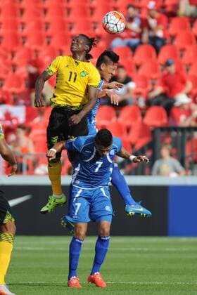 July 14, 2015: Jamaica F Darren Mattocks (11) and El Salvador MF Darwin Ceren (7) in action during the CONCACAF Gold Cup game between Jamaica and El Salvador at BMO Field in Toronto, Ont. SOCCER: JUL 14 CONCACAF Gold Cup - Group Stage - Jamaica v El Salvador Icon15071412 EDITORIAL USE ONLY