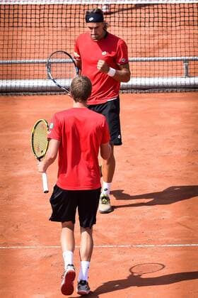 - MIDDELKERKE, BELGIUM: Belgian Ruben Bemelmans and Belgian Kimmer Coppejans celebrate during the third game, a double match between Belgians Ruben Bemelmans and Kimmer Coppejans and Canadians Daniel Nestor and Adil Shamasdin at the Davis Cup quarter final World Group meeting between Belgium and Canada, Saturday 18 July 2015 in Middelkerke. LUCxCLAESSEN  x04666848x