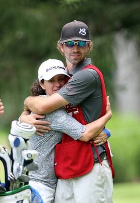July 18, 2015 - Sylvania, Ohio, USA - Mo Martin of Altadena, California hugs Ha Na Jang s caddy at the 6th tee just after the storm alarm was sounded suspending play during the third round of the Marathon LPGA Golf Damen Classic golf tournament at Highland Meadows Golf Club in Sylvania, Ohio, Saturday, July 18, 2015. Marathon Classic  - ZUMAn230