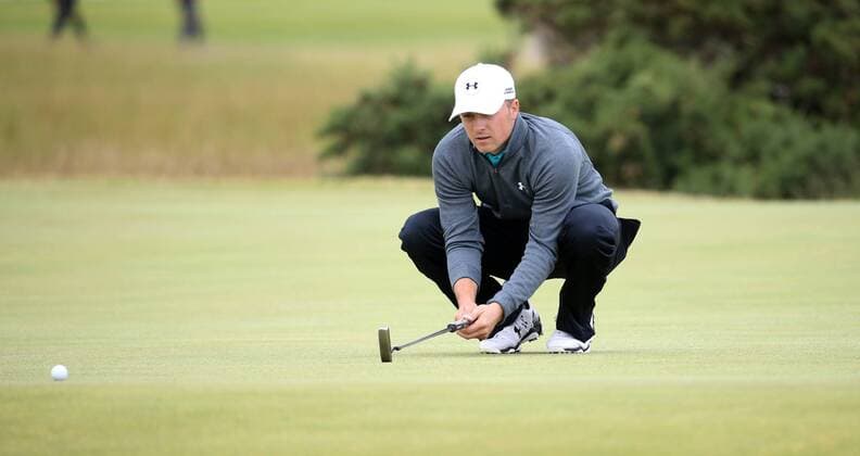 American Jordan Spieth lines up a putt on the eigth hole during the third round at the 144th Open Championship, St.Andrews on July 19 2015.  LON2015071907 HUGOxPHILPOTT