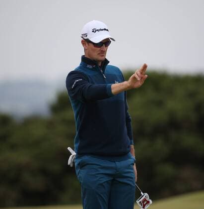 Great Britain s Justin Rose lines up a putt on the eigth green during the third round at the 144th Open Championship, St.Andrews on July 19 2015.  LON2015071922 HUGOxPHILPOTT