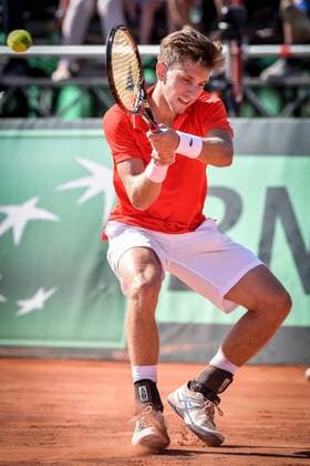 - MIDDELKERKE, BELGIUM: Canada s Filip Peliwo pictured in action during the fifth game between Belgian Steve Darcis and Canadian Filip Peliwo at the Davis Cup quarter final World Group meeting between Belgium and Canada, Sunday 19 July 2015 in Middelkerke. Belgium won and qualified for the semi-finals. LUCxCLAESSEN  x04667518x