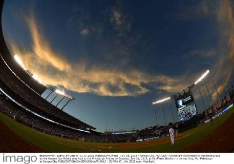 July 21, 2015 - Kansas City, MO, USA - Clouds are illuminated by the setting sun as the Kansas City Royals play host to the Pittsburgh Pirates on Tuesday, July 21, 2015, at Kauffman Stadium in Kansas City, Mo. Pittsburgh at Kansas City - ZUMAm67_
