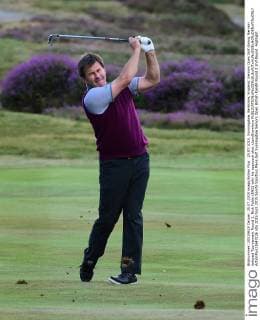 25.07.2015. Sunningdale, Berkshire, England. Seniors Open Golf during the rain delayed Tournament Round 2. Nick Faldo (ENG) with his approach shot xJonxBromleyx  ActionPlus11643226