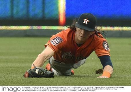 July 25, 2015 - Kansas City, MO, USA - Houston Astros right fielder Colby Rasmus robs the Kansas City Royals Alcides Escobar of a hit in the fourth inning on Saturday, July 25, 2015, at Kauffman Stadium in Kansas City, Mo. Houston at Kansas City - ZUMAm67_