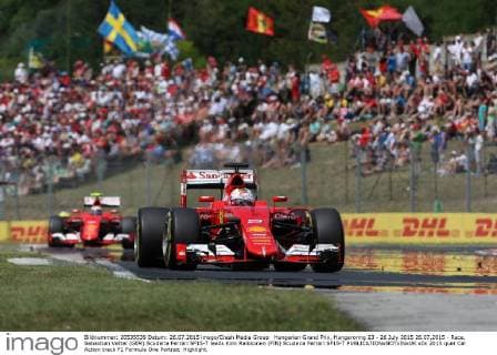 Hungarian Grand Prix, Hungaroring 23 - 26 July 2015 26.07.2015 - Race, Sebastian Vettel (GER) Scuderia Ferrari SF15-T leads Kimi Raikkonen (FIN) Scuderia Ferrari SF15-T 