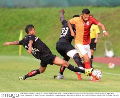 Friendly match between Galatasaray and Nice in Slovenia on July 28, 2015. Final Score: Galatasaray 0 - Nice 4 Pictured: Yasin Oztekin of Galatasaray and Alexandre Mendy 33 of Nice. 