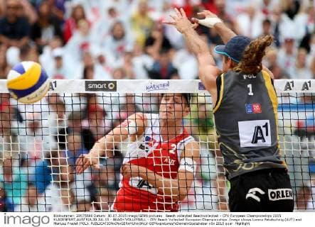 Beach volleyball Beachvolleyball - CEV European Championships 2015 KLAGENFURT,AUSTRIA,30.JUL.15 - BEACH VOLLEYBALL - CEV Beach Volleyball European Championships. Image shows Lorenz Petutschnig (AUT) and Mariusz Prudel (POL). GEPAxpictures xDanielxGoetzhaber