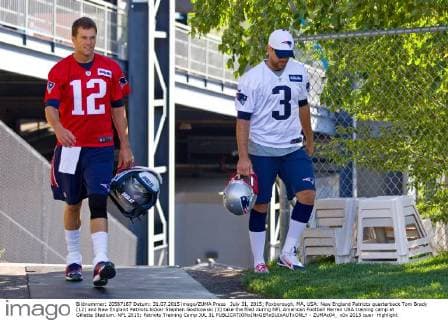 July 31, 2015; Foxborough, MA, USA: New England Patriots quarterback Tom Brady (12) and New England Patriots kicker Stephen Gostkowski (3) take the filed during NFL American Football Herren USA training camp at Gillette Stadium. NFL 2015: Patriots Training Camp JUL 31 - ZUMAc04_