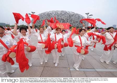 BEIJING, CHINA - JULY 31: (CHINA OUT) People celebrate in front of the National Stadium after Beijing was awarded as host city for the 2022 Winter Olympic Games Olympische Spiele Olympia OS on July 31, 2015 in Beijing, China.  CFP471004602 