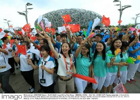 BEIJING, CHINA - JULY 31: (CHINA OUT) People celebrate in front of the National Stadium after Beijing was awarded as host city for the 2022 Winter Olympic Games Olympische Spiele Olympia OS on July 31, 2015 in Beijing, China.  CFP471005731 