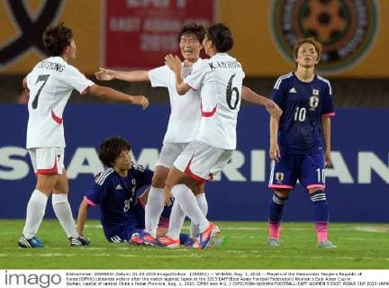 (150801) -- WUHAN, Aug. 1, 2015 -- Players of the Democratic People s Republic of Korea (DPRK) celebrate victory after the match against Japan at the 2015 EAFF(East Asian Football Federation) Women s East Asian Cup in Wuhan, capital of central China s Hubei Province, Aug. 1, 2015. DPRK won 4-2. ) (SP)CHINA-WUHAN-FOOTBALL-EAFF WOMEN S EAST ASIAN CUP 2015-JAPAN VS DPRK ChengxMin 