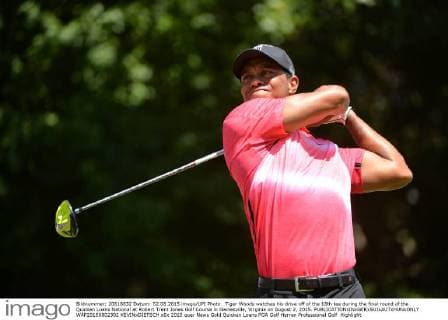 Tiger Woods watches his drive off of the 18th tee during the final round of the Quicken Loans National at Robert Trent Jones Golf Course in Gainesville, Virginia on August 2, 2015.  WAP20150802302 KEVINxDIETSCH