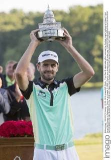 Troy Merritt celebrates after winning the Quicken Loans National at Robert Trent Jones Golf Course in Gainesville, Virginia on August 2, 2015. Merritt won shooting an 18-under-par.  WAP20150802309 KEVINxDIETSCH