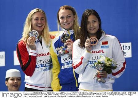 SWIMMING - FINA World Championships 2015 KAZAN,RUSSIA,03.AUG.15 - SWIMMING - FINA World Championships 2015, 100m butterfly, women, award ceremony. Image shows Jeanette Ottesen (DEN), Sarah Sjostrom (SWE) and Ying Lu (CHN). Keywords: medal. GEPAxpictures xPhilippxBrem