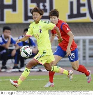 Japan play South Korea in women s East Asian Cup Mami Kyokawa (L) of Japan and Lee Geummin of South Korea vie for the ball during the first half of their game in the women s tournament at the East Asian cup in Wuhan, China, on Aug. 4, 2015. 