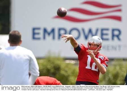 August 4, 2015: New England Patriots quarterback Tom Brady (12) throws a pass during the New England Patriots training camp held on the practice field at Gillette Stadium, in Foxborough, Massachusetts. NFL American Football Herren USA 2015: Patriots Training Camp AUG 04 - ZUMAc04_