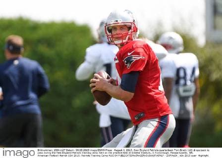 August 4, 2015: New England Patriots quarterback Tom Brady (12) drops back to pass during the New England Patriots training camp held on the practice field at Gillette Stadium, in Foxborough, Massachusetts. NFL American Football Herren USA 2015: Patriots Training Camp AUG 04 - ZUMAc04_