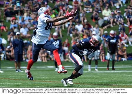 August 4, 2015: New England Patriots wide receiver Brian Tyms (84) stretches out to make a catch during the New England Patriots training camp held on the practice field at Gillette Stadium, in Foxborough, Massachusetts. NFL American Football Herren USA 2015: Patriots Training Camp AUG 04 - ZUMAc04_