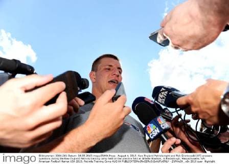 August 4, 2015: New England Patriots tight end Rob Gronkowski (87) answers questions during the New England Patriots training camp held on the practice field at Gillette Stadium, in Foxborough, Massachusetts. NFL American Football Herren USA 2015: Patriots Training Camp AUG 04 - ZUMAc04_