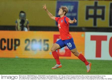 Jeon Ga-eul of South Korea celebrates after scoring a goal against Japan during their soccer match of the Women s East Asian Cup 2015 in Wuhan city, central China s Hubei province, 4 August 2015. South Korea beat Japan 2-1 at the Women s East Asian Cup in Wuhan on Tuesday (4 August 2015), giving the team their second victory in the ongoing tournament after they defeated China on Saturday. The first half saw Japan in the lead with a goal from Emi Nakajima, but South Korea came back in the second half when captain Cho So-Hyun equalised in the 54th minute. Midfielder Jeon Ga-Eul then sealed the team s fate during three minutes of injury time. South Korea beat Japan 2-1 in Women s East Asian Cup  20150804_63255