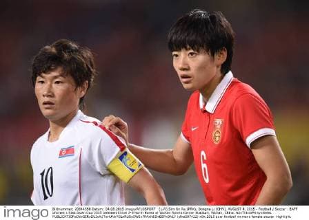 (L-R) Sim Un Ra (PRK), Dongna Li (CHN), AUGUST 4, 2015 - Football Soccer : EAFF Women s East Asian Cup 2015 between China 2-3 North Korea at Wuhan Sports Center Stadium, Wuhan, China. NoxThirdxPartyxSales  (dlra007412)
