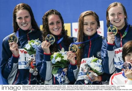 KAZAN, RUSSIA. AUGUST 6, 2015. Gold medal winners Missy Franklin, Leah Smith, Katie McLaughlin, and Katie Ledecky (L-R) of the United States (USA) during the medal ceremony for the ladies 4x200m freestyle relay final in Kazan Arena at the 16th FINA World Championships. Sergei Savostyanov TASS  TS0093E8
