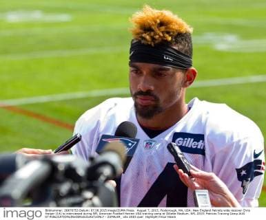 August 7, 2015; Foxborough, MA, USA: New England Patriots wide receiver Chris Harper (14) is interviewed during NFL American Football Herren USA training camp at Gillette Stadium. NFL 2015: Patriots Training Camp AUG 07 - ZUMAc04_