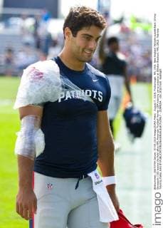 August 7, 2015; Foxborough, MA, USA: New England Patriots quarterback Jimmy Garoppolo (10) leaves the field after NFL American Football Herren USA training camp practice at Gillette Stadium. NFL 2015: Patriots Training Camp AUG 07 - ZUMAc04_
