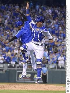 Aug. 7, 2015 - Kansas City, MO, USA - Kansas City Royals catcher Salvador Perez, right, celebrates with Yordano Ventura after a 3-2 win against the Chicago White Sox at Kauffman Stadium in Kansas City, Mo., on Friday, Aug. 7, 2015. Chicago White Sox at Kansas City Royals - ZUMAm67_