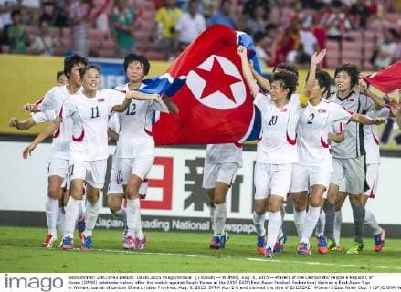 (150808) -- WUHAN, Aug. 8, 2015 -- Players of the Democratic People s Republic of Korea (DPRK) celebrate victory after the match against South Korea at the 2015 EAFF(East Asian Football Federation) Women s East Asian Cup in Wuhan, capital of central China s Hubei Province, Aug. 8, 2015. DPRK won 2-0 and claimed the title of 2015 EAEF Women s East Asian Cup. ) (SP)CHINA-WUHAN-FOOTBALL-EAFF EAST ASIAN CUP 2015-WOMEN-CHAMPIONSHIP XiaoxYijiu 