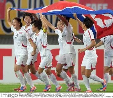 (150808) -- WUHAN, Aug. 8, 2015 -- Players of the Democratic People s Republic of Korea (DPRK) celebrate victory after the match against South Korea at the 2015 EAFF(East Asian Football Federation) Women s East Asian Cup in Wuhan, capital of central China s Hubei Province, Aug. 8, 2015. DPRK won 2-0 and claimed the title of 2015 EAEF Women s East Asian Cup. ) (SP)CHINA-WUHAN-FOOTBALL-EAFF EAST ASIAN CUP 2015-WOMEN-CHAMPIONSHIP ChengxMin 