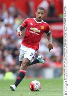 Memphis Depay of Manchester United ManU - Manchester United vs. Tottenham Hotspurs - Barclay s Premier League - Old Trafford - Manchester - 08 08 2015 Pic Philip Oldham Sportimage EDITORIAL USE ONLY. No use with unauthorised audio, video, data, fixture lists, club league logos or live services. Online in-match use limited to 120 images, no video emulation. No use in betting, games or single club league player publications.