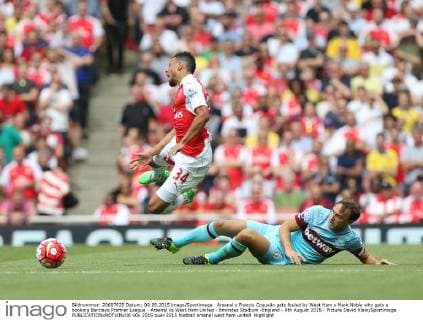 Arsenal s Francis Coquelin gets fouled by West Ham s Mark Noble who gets a booking Barclays Premier League - Arsenal vs West Ham United - Emirates Stadium -England - 9th August 2015 - Picture David Klein Sportimage EDITORIAL USE ONLY. No use with unauthorised audio, video, data, fixture lists, club league logos or live services. Online in-match use limited to 120 images, no video emulation. No use in betting, games or single club league player publications.