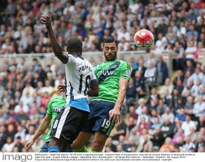 Graziano Pelle of Southampton rises above Chancel Mbemba of Newcastle United to head first goal - English Premier League - Newcastle Utd v Southampton - St James Park Stadium - Newcastle - England - 9th August 2015 - Picture Simon Bellis Sportimage EDITORIAL USE ONLY. No use with unauthorised audio, video, data, fixture lists, club league logos or live services. Online in-match use limited to 120 images, no video emulation. No use in betting, games or single club league player publications.