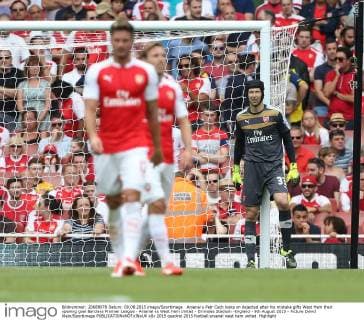 Arsenal s Petr Cech looks on dejected after his mistake gifts West Ham their opening goal Barclays Premier League - Arsenal vs West Ham United - Emirates Stadium -England - 9th August 2015 - Picture David Klein Sportimage EDITORIAL USE ONLY. No use with unauthorised audio, video, data, fixture lists, club league logos or live services. Online in-match use limited to 120 images, no video emulation. No use in betting, games or single club league player publications.