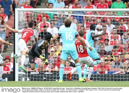 West Ham s Cheikhou Kouyate beats Arsenal s Petr Cech to the ball to put his side 1-0 up Barclays Premier League - Arsenal vs West Ham United - Emirates Stadium -England - 9th August 2015 - Picture David Klein Sportimage EDITORIAL USE ONLY. No use with unauthorised audio, video, data, fixture lists, club league logos or live services. Online in-match use limited to 120 images, no video emulation. No use in betting, games or single club league player publications.