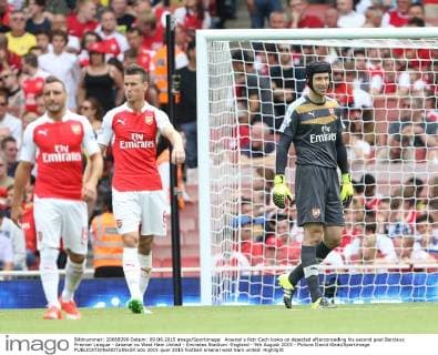 Arsenal s Petr Cech looks on dejected afterconceding his second goal Barclays Premier League - Arsenal vs West Ham United - Emirates Stadium -England - 9th August 2015 - Picture David Klein Sportimage EDITORIAL USE ONLY. No use with unauthorised audio, video, data, fixture lists, club league logos or live services. Online in-match use limited to 120 images, no video emulation. No use in betting, games or single club league player publications.
