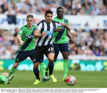 Aleksander Mitrovic of Newcastle United runs through two Southampton players - English Premier League - Newcastle Utd v Southampton - St James Park Stadium - Newcastle - England - 9th August 2015 - Picture Simon Bellis Sportimage EDITORIAL USE ONLY. No use with unauthorised audio, video, data, fixture lists, club league logos or live services. Online in-match use limited to 120 images, no video emulation. No use in betting, games or single club league player publications.