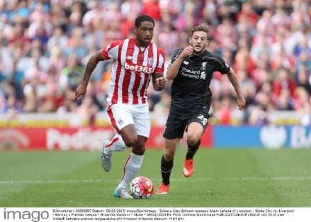 Stoke s Glen Johnson escapes Adam Lallana of Liverpool - Stoke City vs. Liverpool - Barclay s Premier League - Britannia Stadium - Stoke - 09 08 2015 Pic Philip Oldham Sportimage EDITORIAL USE ONLY. No use with unauthorised audio, video, data, fixture lists, club league logos or live services. Online in-match use limited to 120 images, no video emulation. No use in betting, games or single club league player publications.