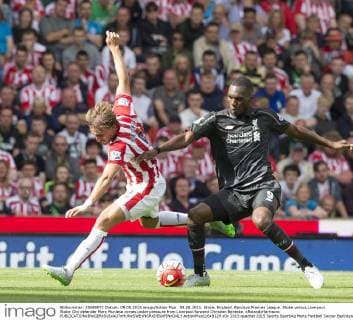 09.08.2015. Stoke, England. Barclays Premier League. Stoke versus Liverpool. Stoke City defender Marc Muniesa comes under pressure from Liverpool forward Christian Benteke. xRolandxHarrisonx  ActionPlus11648129