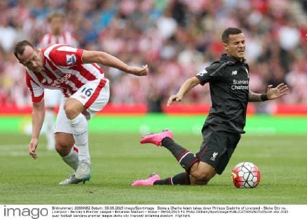 Stoke s Charlie Adam takes down Philippe Coutinho of Liverpool - Stoke City vs. Liverpool - Barclay s Premier League - Britannia Stadium - Stoke - 09 08 2015 Pic Philip Oldham Sportimage EDITORIAL USE ONLY. No use with unauthorised audio, video, data, fixture lists, club league logos or live services. Online in-match use limited to 120 images, no video emulation. No use in betting, games or single club league player publications.