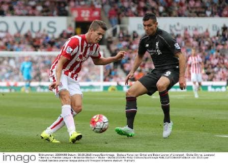 Stoke s Marco van Ginkel and Dejan Lovren of Liverpool - Stoke City vs. Liverpool - Barclay s Premier League - Britannia Stadium - Stoke - 09 08 2015 Pic Philip Oldham Sportimage EDITORIAL USE ONLY. No use with unauthorised audio, video, data, fixture lists, club league logos or live services. Online in-match use limited to 120 images, no video emulation. No use in betting, games or single club league player publications.