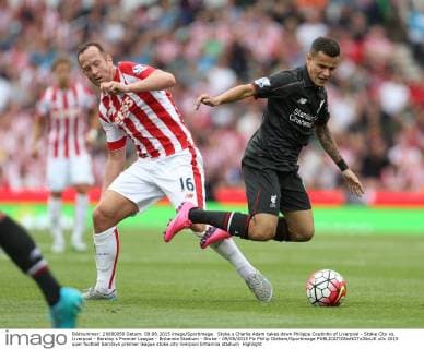 Stoke s Charlie Adam takes down Philippe Coutinho of Liverpool - Stoke City vs. Liverpool - Barclay s Premier League - Britannia Stadium - Stoke - 09 08 2015 Pic Philip Oldham Sportimage EDITORIAL USE ONLY. No use with unauthorised audio, video, data, fixture lists, club league logos or live services. Online in-match use limited to 120 images, no video emulation. No use in betting, games or single club league player publications.